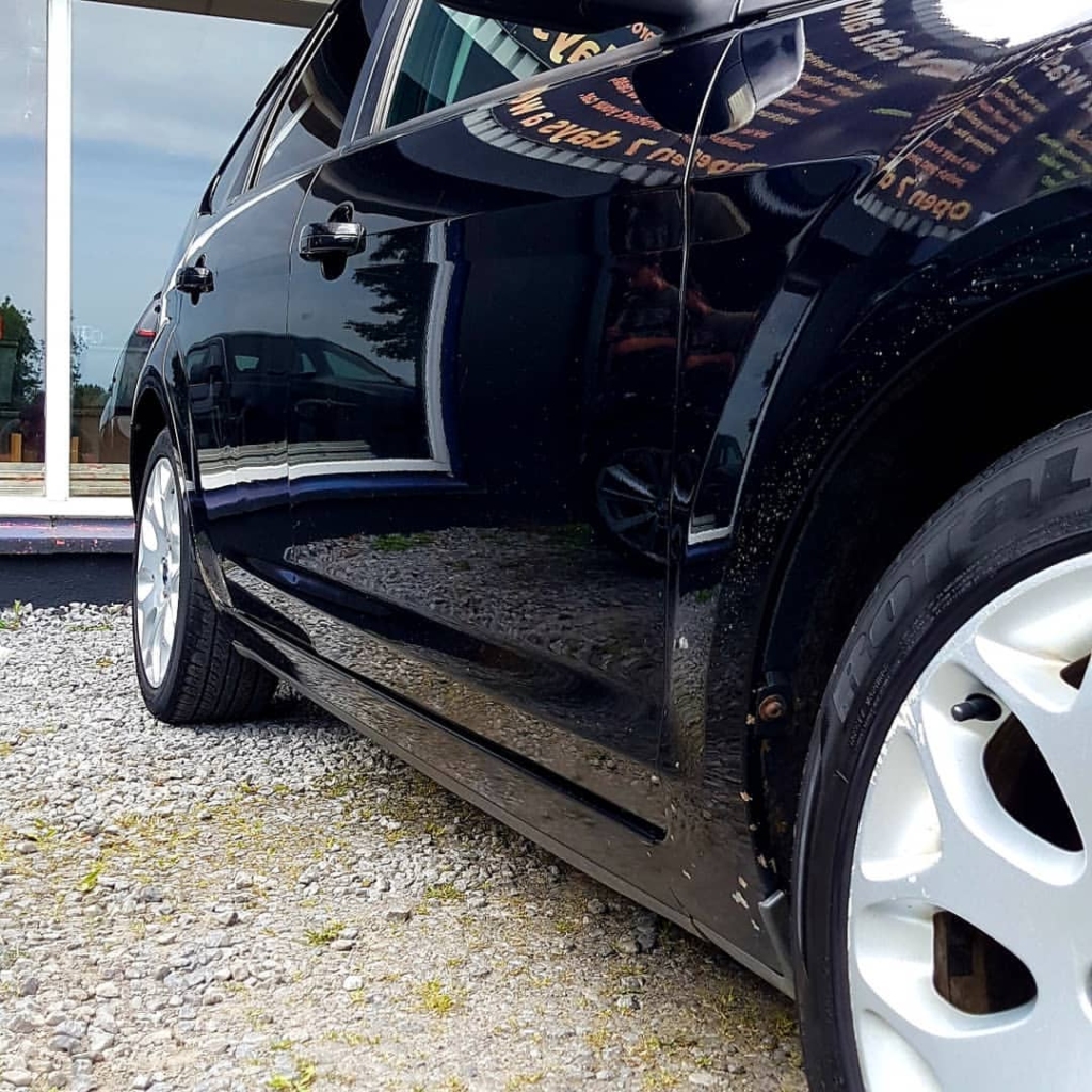 A fully protected luxury or classic car in Roscommon detailing studio, shielded against road salt and harsh weather conditions in the Midlands and West of Ireland.