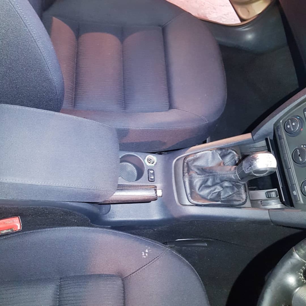 Cleaning exterior glass and mirrors to a streak-free finish during a Mini Valet refresh in Roscommon.