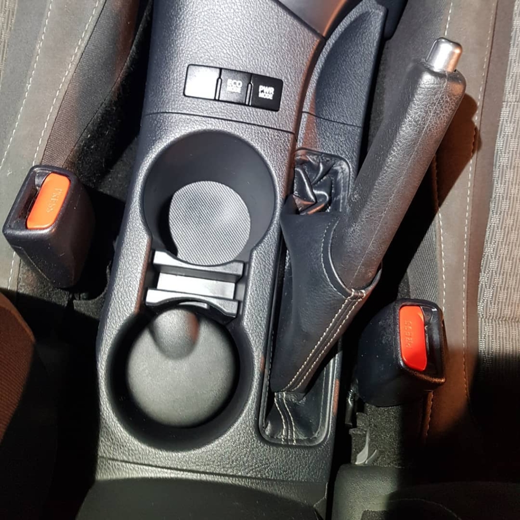 Wiping down interior surfaces and applying a fresh scent to complete a maintenance valet in Co. Roscommon.