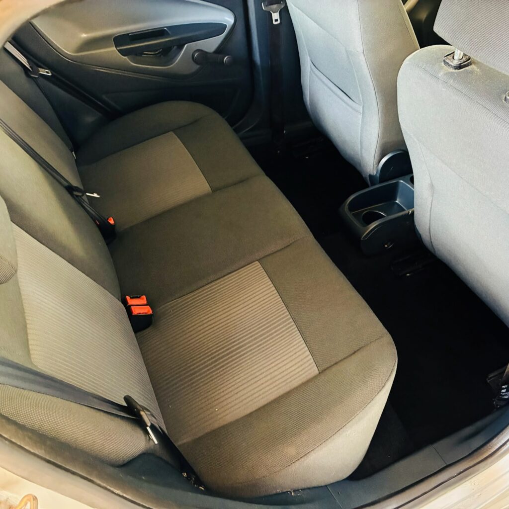 Valeted rear cabin with vacuumed and shampooed cloth seats and carpets for a Foynes driver at AG Valeting & Detailing.