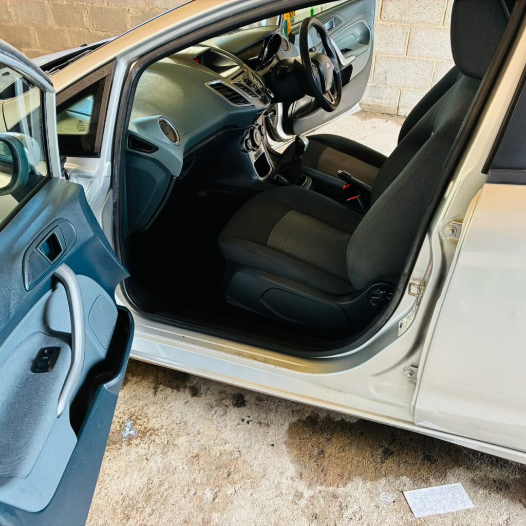 Valeted front passenger area featuring a shampooed seat, clean glass and dressed trim on a Palaskenry private vehicle at AG Valeting & Detailing in Kilcornan.