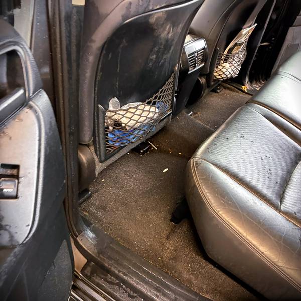 Dirty cabin interior with loose dirt and floor mat debris in Foynes prior to Mini Valet vacuuming at AG Valeting & Detailing in Kilcornan.