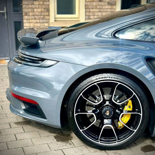 Rear right profile view of a cobalt coloured Porsche finished with a durable Titan Coatings 5-year graphene ceramic coating.