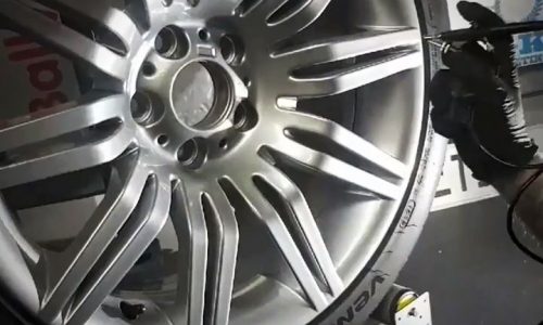 Applying specialized 9H wheel ceramic to prevent brake dust buildup, a must-have service for car enthusiasts near Dunshaughlin, Navan, Ashbourne, Meath & Dublin.