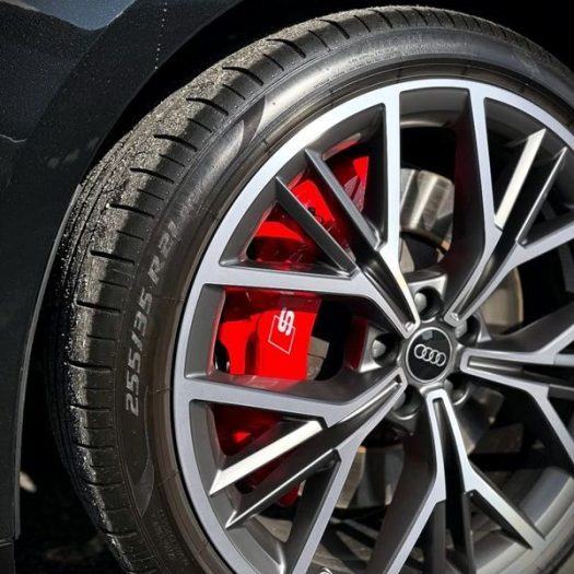 The freshly painted, branded, and coated caliper showing off as a sharp, durable feature behind a clean alloy wheel in Dublin 7.