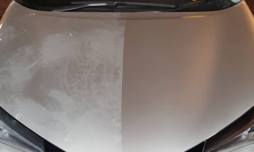 Comparison image of a car bonnet undergoing proper paint correction in Roscommon – half bonnet sanded, the other half after already removed deep dullness and scratches.