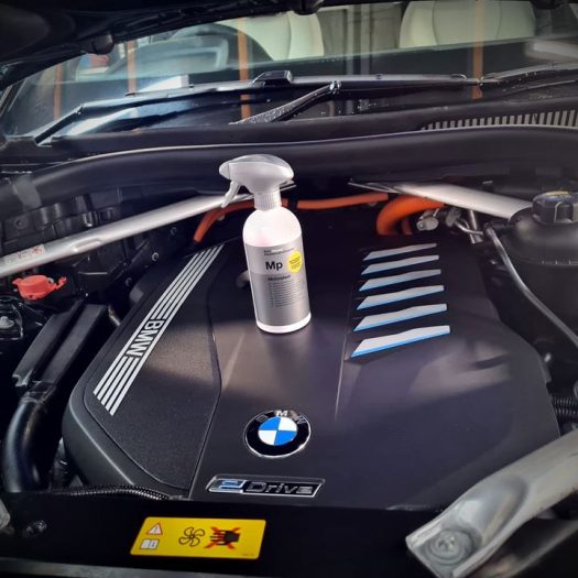 A tidy and dressed engine bay area with clean plastic covers at Car Valet Hero in Dunshaughlin.