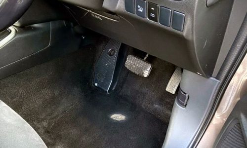 Quick dashboard wipe-down and cabin refresh as part of an express vehicle valet.