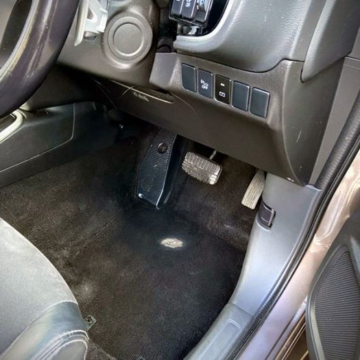 Quick dashboard wipe-down and cabin refresh as part of an express vehicle valet.