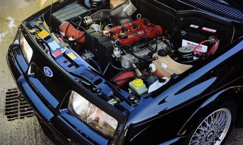 A black vintage car stunning gloss outside and under the bonnet after it got the Gold Car Detailing Pack in Dublin