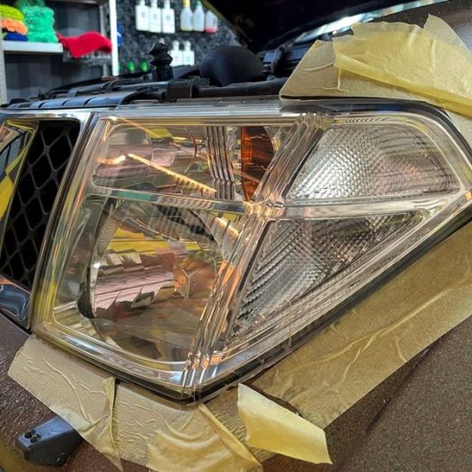 Left side perspective of a flawless, scratch-free acrylic lens sealed with a durable UV ceramic coating layer.