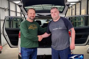 JetClean Valet and Detail owner shakes hands with a Car Valet Hero representative in Loughanaskin, Athlone.