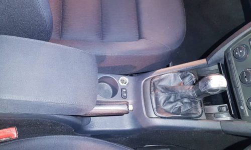 Cleaning exterior glass and mirrors to a streak-free finish during a Mini Valet refresh in Roscommon.