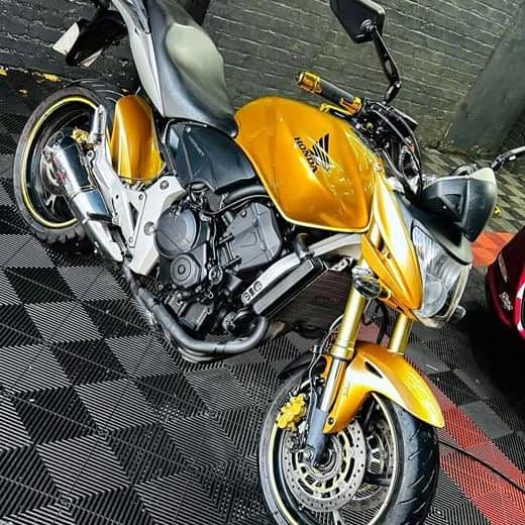 Precision detailing of a motorbike engine and frame in Dublin by Invi Detailing (Car Valet Hero Dublin 7).
